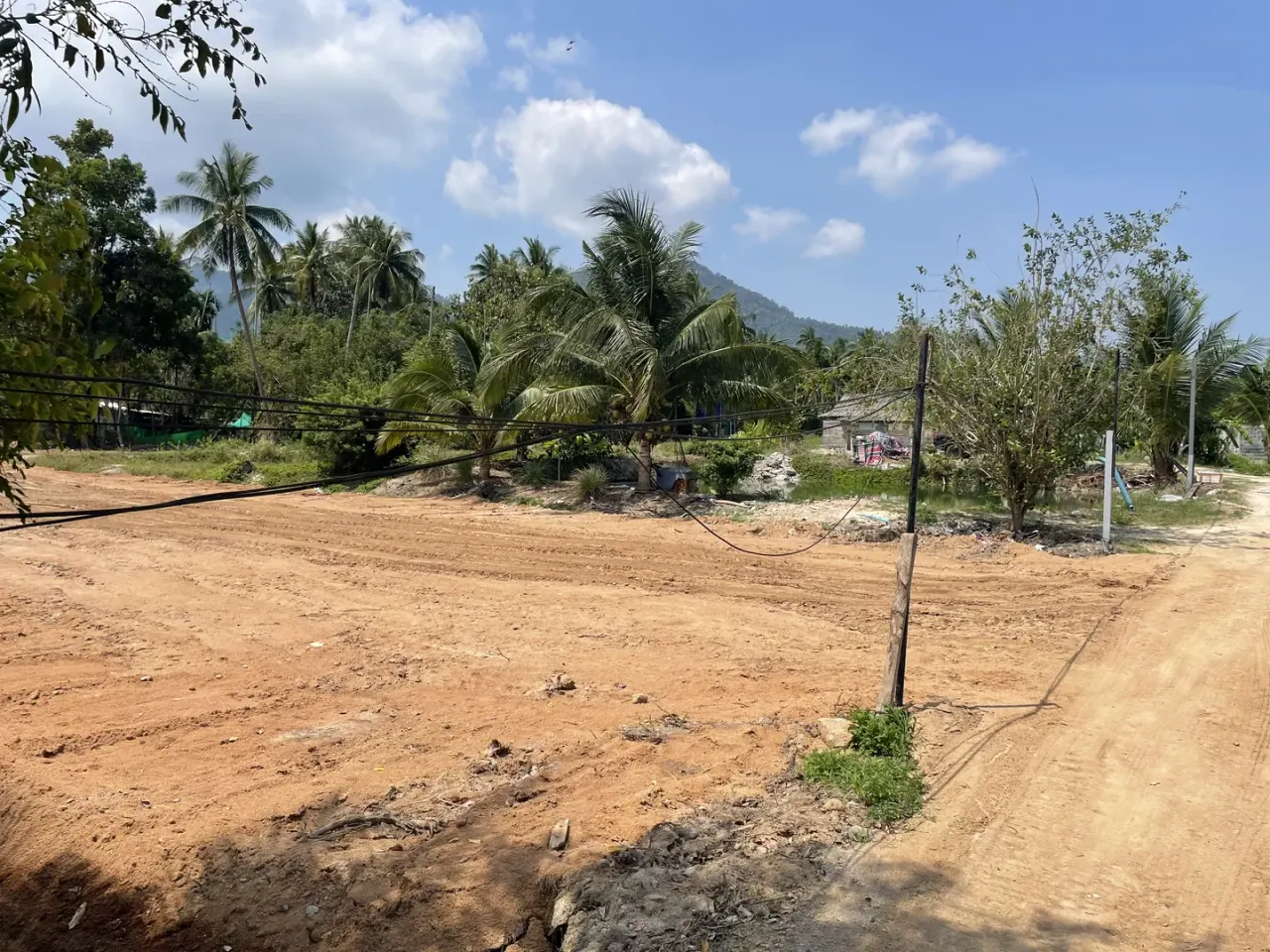 Drainage channel cleared and deepened, area backfilled